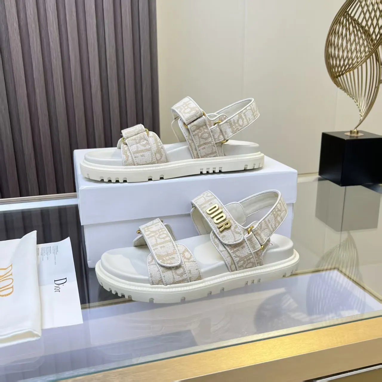 👟👟Ex-factory price 480👟👟 Dior classic popular sandals Step into the fashion territory of Dior slippers and encounter the ultimate fusion of elegance and comfort. The upper is engraved with the Christian Dior Paris logo using exquisite embroidery technology. The delicate stitching tells the brand's profound heritage and is fully recognizable.   Made of high-quality materials, it feels soft and fits your feet, as if it is a gentle care tailor-made for your feet. The sole is carefully designed and engraved with Christian Dior's lucky star symbol. It is not only a beautiful embellishment, but also provides reliable grip, making every step steady and secure.   It has a simple design and is easy to put on and take off. Whether it is a lazy weekend or a pleasant vacation, it can be easily adapted. Whether paired with casual shorts, casual jeans, or an elegant dress, Dior slippers can instantly enhance the overall style and show a casual fashion attitude.   Dior slippers, in the name of fashion, inject luxurious charm into your life and accompany you with every step you take with confidence and elegance. Material: Fine genuine cowhide upper, outsole, TPR, non-slip and wear-resistant, code number: 35-41 (42 customized)